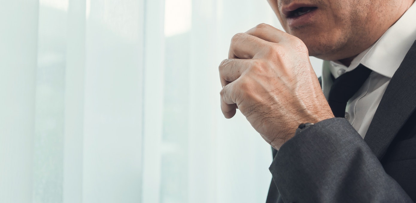 An image depicting a person suffering from coughing up a watery substance symptoms