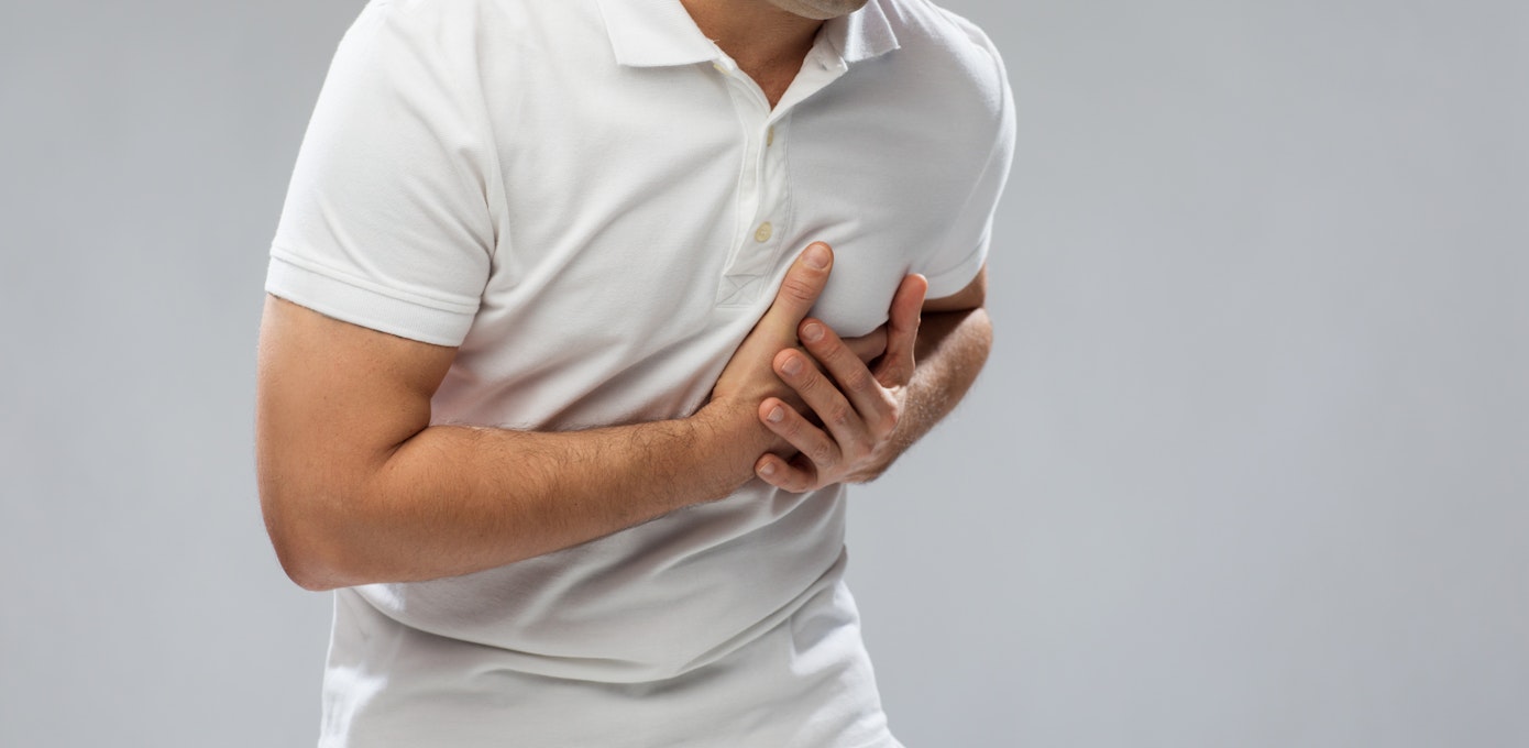 An image depicting a person suffering from irregular heart beat symptoms