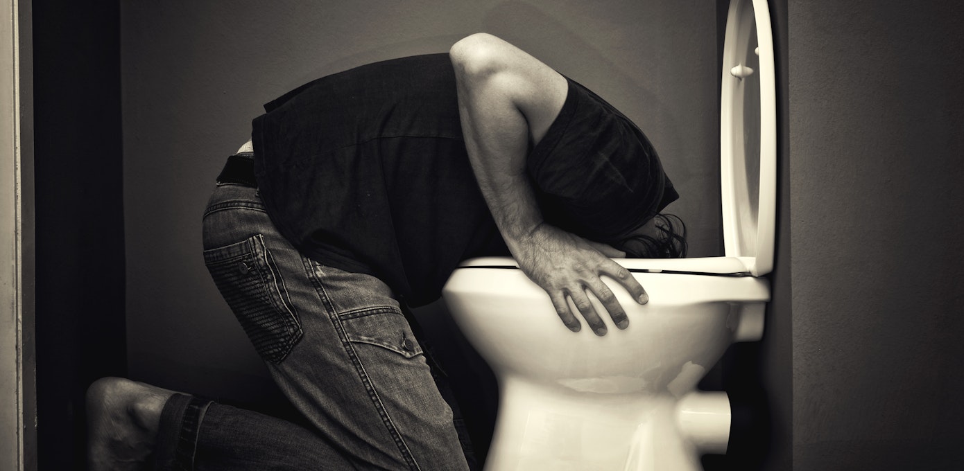 An image depicting a person suffering from regurgitation symptoms